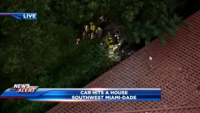 Driver hospitalized after crashing into home in SW Miami-Dade