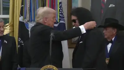 Trump awards medals to the Kennedy Center honorees in an Oval Office ceremony