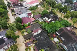 Death toll from floods and landslides on Indonesia's Sumatra rises to 174