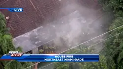 Fire crews battle flames that erupted at NE Miami-Dade home
