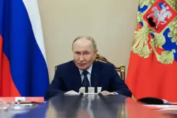 Putin says Russia will stick to nuclear arms limits for one more year after treaty with US expires