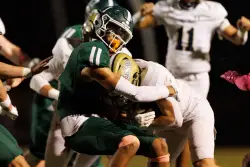 Hard-hitting Foxboro wins defensive battle over Canton