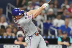 Alonso and Holmes lead Mets past Marlins 5-0 to push NL wild-card race to final day of season