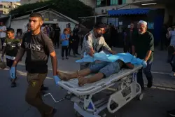 Israel launches strikes in Gaza ceasefire’s latest test as hospitals say 20 killed