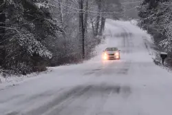 Winter storm dumps snow, rain across southern New England