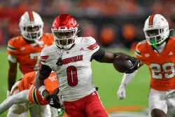Louisville intercepts 4 of Beck’s passes, tops No. 2 Miami 24-21 to end Hurricanes’ home streak