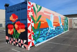 Volunteers come out to paint mural at new Pacific Beach Arts Center